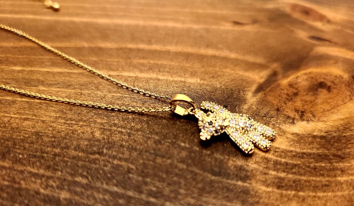 14k Gold plated Crystal Bear Bowtie Pendant.